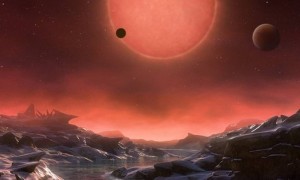 Ilustração da estrela Trappist 1 a partir da perspectiva de um dos planetas descobertos